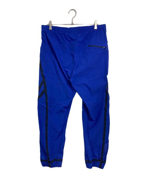 LACOSTE（ラコステ）LACOSTE (ラコステ) テックプリントトラックパンツ　ナイロン混パンツ ブルー サイズ:Lの古着・服飾アイテム