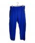 LACOSTE（ラコステ）の古着「テックプリントトラックパンツ　ナイロン混パンツ」｜ブルー