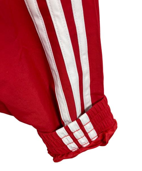 adidas（アディダス）adidas (アディダス) アディカラー ウーブン ファイヤーバード トラックトップ　アウター　ライトアウター　スポーツ　アウトドア レッド サイズ:L 未使用品の古着・服飾アイテム