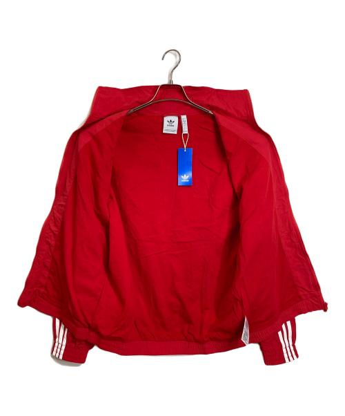 adidas（アディダス）adidas (アディダス) アディカラー ウーブン ファイヤーバード トラックトップ　アウター　ライトアウター　スポーツ　アウトドア レッド サイズ:L 未使用品の古着・服飾アイテム