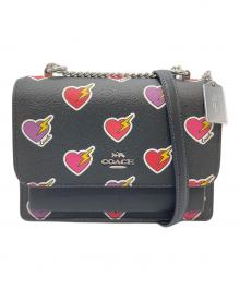 COACH（コーチ）の古着「クレア クロスボディ バッグ・ハート ボルト プリント　ショルダーバッグ」｜ブラック