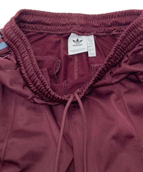 adidas（アディダス）adidas (アディダス) トラックパンツ ジェンダーニュートラル　ジャージ　スポーツ　アウトドア マルーン サイズ:Lの古着・服飾アイテム