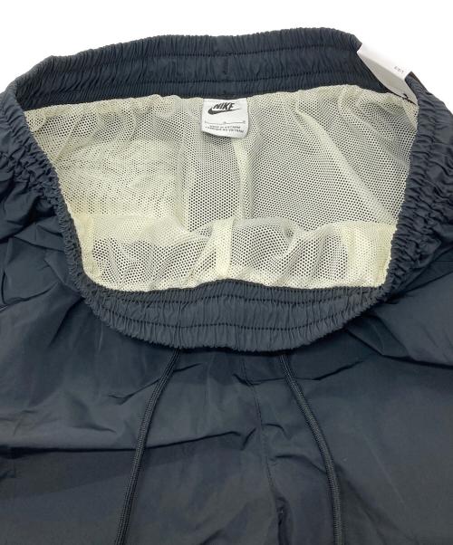 NIKE（ナイキ）NIKE (ナイキ) ビッグスウッシュ ウーブン パンツ　スポーツ　アウトドア　25AW ブラック サイズ:L 未使用品の古着・服飾アイテム