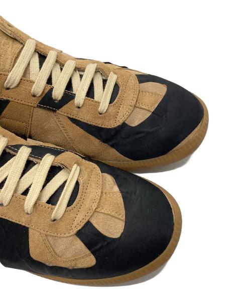 Maison Margiela（メゾンマルジェラ）Maison Margiela (メゾンマルジェラ) REPLICA ジャーマントレーナー　イタリア製 ベージュ×ブラック サイズ:41の古着・服飾アイテム