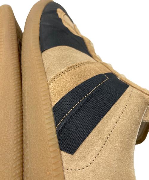 Maison Margiela（メゾンマルジェラ）Maison Margiela (メゾンマルジェラ) REPLICA ジャーマントレーナー　イタリア製 ベージュ×ブラック サイズ:41の古着・服飾アイテム