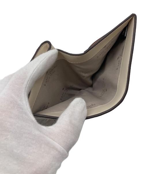 Kate Spade（ケイトスペード）Kate Spade (ケイトスペード) 2つ折り財布　スペードフラワー ベージュ サイズ:実寸参照の古着・服飾アイテム