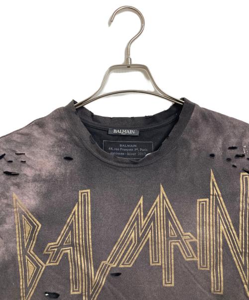 BALMAIN（バルマン）BALMAIN (バルマン) デストロイロゴダメージ加工Tシャツ　半袖カットソー　Tシャツ　Tee  フランス製 グレー サイズ:TUの古着・服飾アイテム