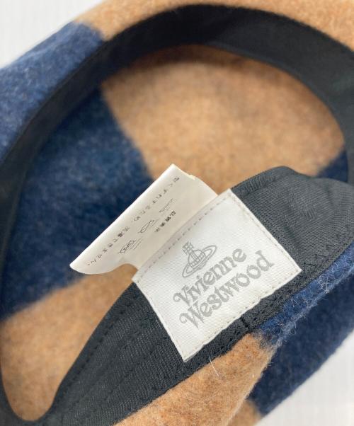 Vivienne Westwood（ヴィヴィアンウエストウッド）Vivienne Westwood (ヴィヴィアンウエストウッド) スタッズ付きデカオーブベレー帽 ベージュ×ネイビー サイズ:S~Mの古着・服飾アイテム