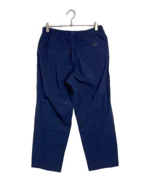 GRAMICCI（グラミチ）GRAMICCI (グラミチ) B-SHOP (ビショップ) 2タックワイドテーパードパンツ ネイビー サイズ:L 未使用品の古着・服飾アイテム