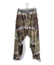 Vivienne Westwood（ヴィヴィアンウエストウッド）の古着「19SS 漢字・中国総柄サルエルスウェットパンツ」｜オリーブ