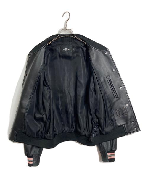 COACH（コーチ）COACH (コーチ) Leather Varsity Jacket  レザーバーシティジャケット レザージャケット　レザースタジャン　アウター　ライトアウター　羊革 ブラック サイズ:Mの古着・服飾アイテム