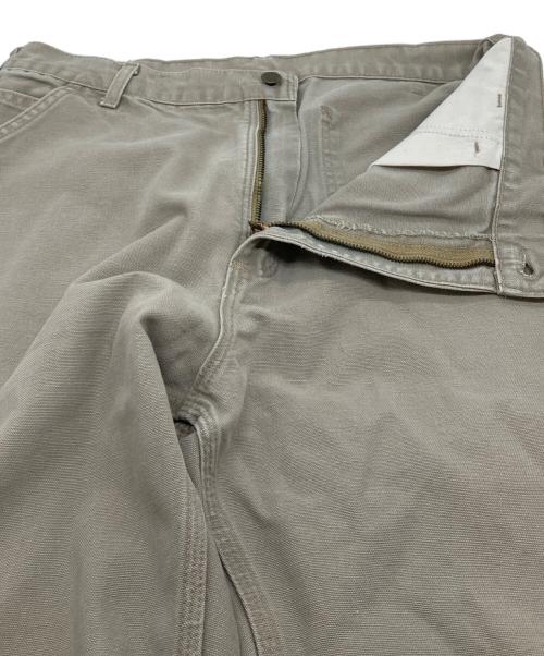 CarHartt（カーハート）CarHartt (カーハート) 【古着】ペインターパンツ　ダック地　ベージュ　ペインターパンツ　レザーパッチ グレー サイズ:36×32の古着・服飾アイテム