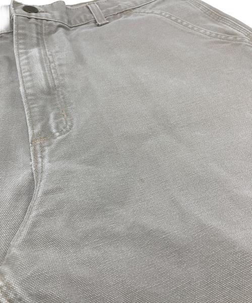 CarHartt（カーハート）CarHartt (カーハート) 【古着】ペインターパンツ　ダック地　ベージュ　ペインターパンツ　レザーパッチ グレー サイズ:36×32の古着・服飾アイテム