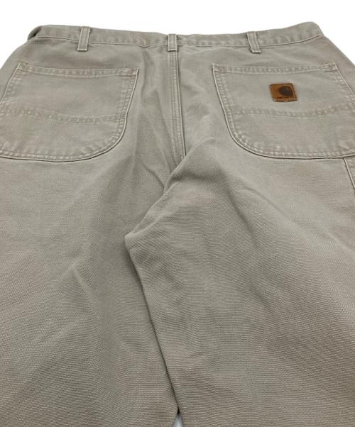 CarHartt（カーハート）CarHartt (カーハート) 【古着】ペインターパンツ　ダック地　ベージュ　ペインターパンツ　レザーパッチ グレー サイズ:36×32の古着・服飾アイテム