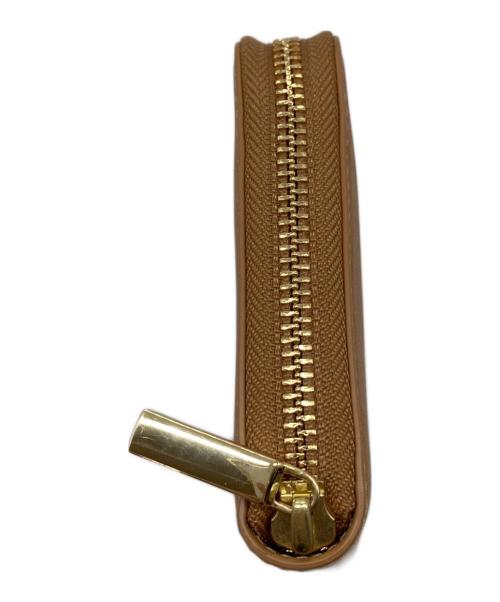 TORY BURCH（トリーバーチ）TORY BURCH (トリーバーチ) ロングウォレット　ラウンドファスナー　長財布 ベージュ サイズ:実寸参照の古着・服飾アイテム