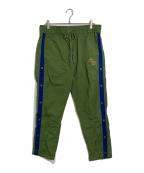Aime Leon Doreエメ レオン ドレ）の古着「WARM-UP NYLON PANTS ウォームアップナイロンパンツパンツ　スナップボタン　ドロストパンツ　2WAYパンツ」｜グリーン×ブルー