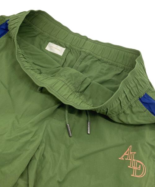 Aime Leon Dore（エメ レオン ドレ）Aime Leon Dore (エメ レオン ドレ) WARM-UP NYLON PANTS ウォームアップナイロンパンツパンツ　スナップボタン　ドロストパンツ　2WAYパンツ グリーン×ブルー サイズ:実寸参照の古着・服飾アイテム