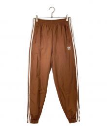 adidas Originals（アディダスオリジナル）の古着「ファイヤーバードトラックパンツ」｜ブラウン