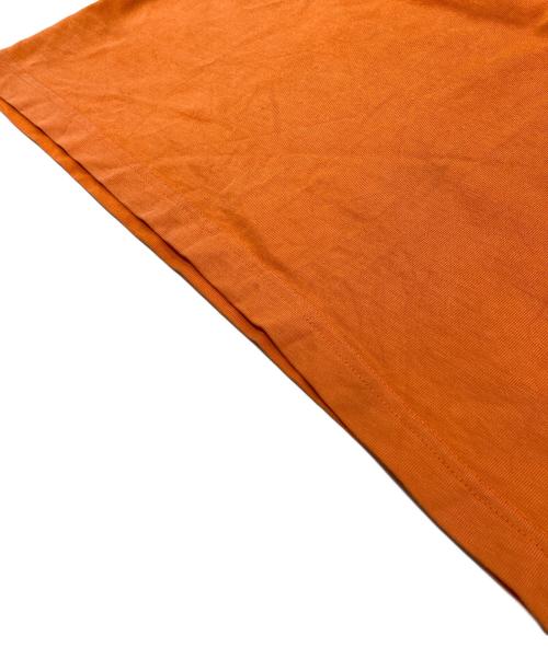 CarHartt（カーハート）CarHartt (カーハート) HERON PRESTON (ヘロンプレストン) プリントカットソー　ロングカットソー　コットン オレンジ サイズ:Sの古着・服飾アイテム