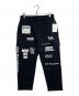 WHITE MOUNTAINEERING（ホワイトマウンテ二アニング）の古着「WM LOGO RANDAM PRINTED SWEAT PANTS」｜ブラック