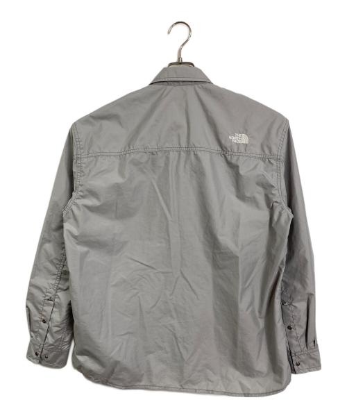 THE NORTH FACE（ザ ノース フェイス）THE NORTH FACE (ザ ノース フェイス) ロングスリーブヌプシシャツ　ナイロンシャツ　長袖シャツ　スポーツ　アウトドア グレー サイズ:Mの古着・服飾アイテム