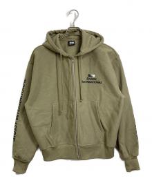 stussy（ステューシー）の古着「international ジップアップパーカー」｜カーキ