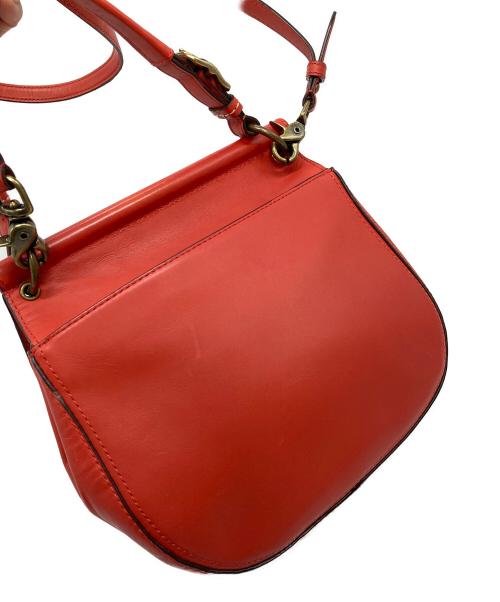 COACH（コーチ）COACH (コーチ) ターンロック ショルダーバッグ オレンジ サイズ:実寸参照の古着・服飾アイテム