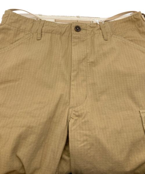 nanamica（ナナミカ）nanamica (ナナミカ) nanamica Cargo Shorts  ナナミカカーゴショーツ  カーゴショートパンツ　ハーフパンツ ベージュ サイズ:32 未使用品の古着・服飾アイテム