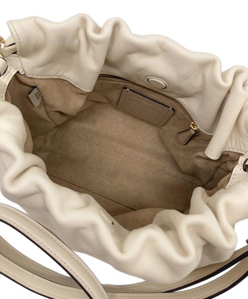 COACH（コーチ）COACH (コーチ) フェイ ドローストリング バッグ　2WAYバッグ サイズ:実寸参照の古着・服飾アイテム