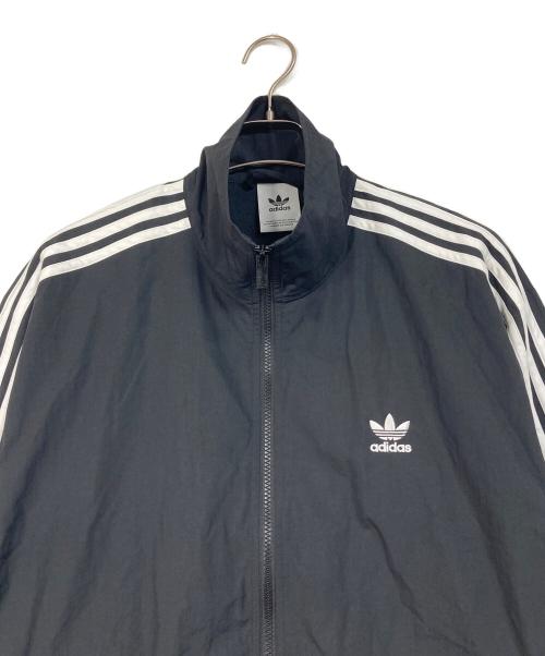 adidas（アディダス）adidas (アディダス) アディカラー ウーブン ファイヤーバード トラックトップ　トラックジャケット　3ライン ブラック サイズ:2XLの古着・服飾アイテム