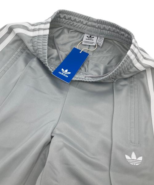 adidas Originals（アディダスオリジナル）adidas originals (アディダスオリジナル) アディカラー クラシック ファイヤーバード ルーズトラックパンツ グレー サイズ:S 未使用品の古着・服飾アイテム