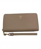 COACHコーチ）の古着「ラウンドジップウォレット」｜ベージュ
