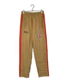 adidas×ERIC EMANUEL（アディダス×エリック エマニュエル）の古着「マクドナルドコラボナイロントラックパンツ」｜ベージュ
