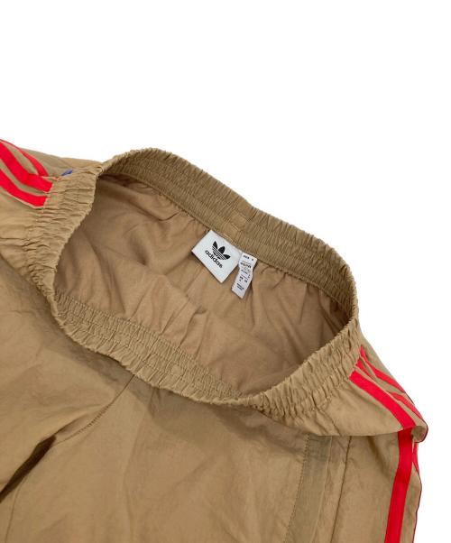 adidas（アディダス）adidas (アディダス) ERIC EMANUEL (エリック エマニュエル) マクドナルドコラボナイロントラックパンツ ベージュ サイズ:Mの古着・服飾アイテム