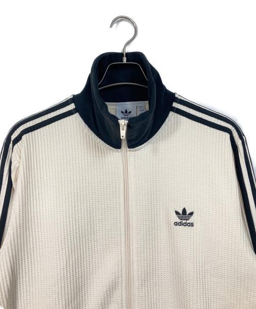 adidas（アディダス）adidas (アディダス) アディカラー ベッケンバウアー ワッフルトラックトップ アイボリー サイズ:2XL 未使用品の古着・服飾アイテム
