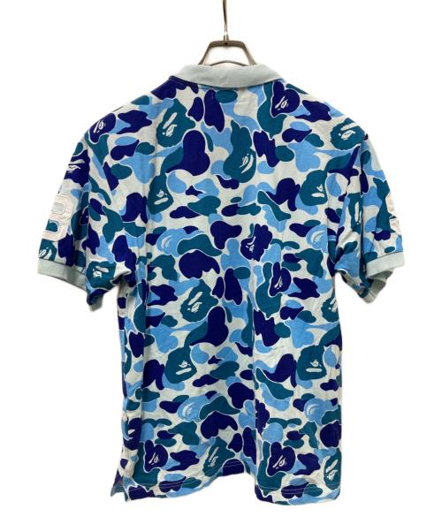 A BATHING APE（ア ベイシング エイプ）A BATHING APE (ア ベイシング エイプ) ABC CAMO LARGE APE HEAD POLO スカイブルー サイズ:Mの古着・服飾アイテム