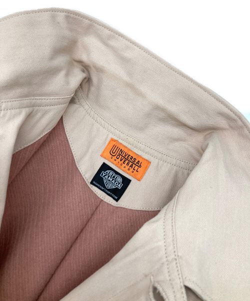 UNIVERSAL OVERALL（ユニバーサルオーバーオール）UNIVERSAL OVERALL (ユニバーサルオーバーオール) TATTOO STUDIO YAMADA (タトゥースタジオヤマダ) カバーオール ピンク サイズ:Mの古着・服飾アイテム