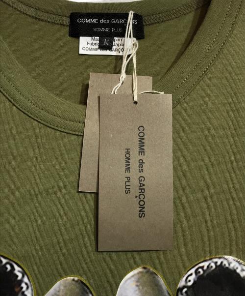 COMME des GARCONS HOMME PLUS（コムデギャルソンオムプリュス）COMME des GARCONS HOMME PLUS (コムデギャルソンオムプリュス) プリントTシャツ グリーン サイズ:M 未使用品の古着・服飾アイテム
