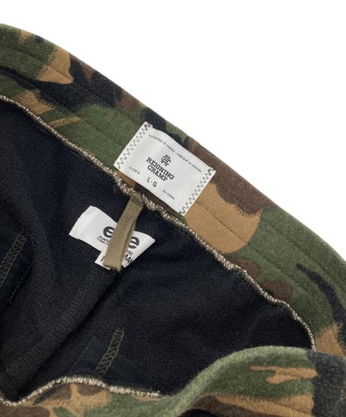 eYe COMME des GARCONS JUNYAWATANABE MAN（アイ コム デ ギャルソン ジュンヤ ワタナベ マン）eYe COMME des GARCONS JUNYAWATANABE MAN REIGNING CHAMP (レイニングチャンプ) コラボスウェットパンツ カーキ×ブラック サイズ:Mの古着・服飾アイテム