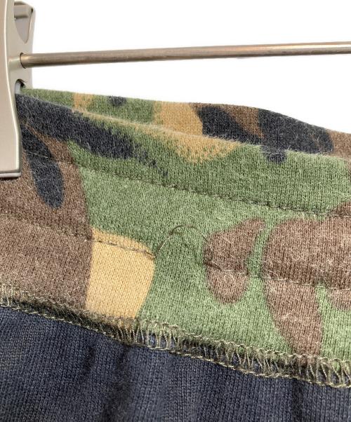 eYe COMME des GARCONS JUNYAWATANABE MAN（アイ コム デ ギャルソン ジュンヤ ワタナベ マン）eYe COMME des GARCONS JUNYAWATANABE MAN REIGNING CHAMP (レイニングチャンプ) コラボスウェットパンツ カーキ×ブラック サイズ:Mの古着・服飾アイテム