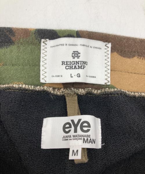 eYe COMME des GARCONS JUNYAWATANABE MAN（アイ コム デ ギャルソン ジュンヤ ワタナベ マン）eYe COMME des GARCONS JUNYAWATANABE MAN REIGNING CHAMP (レイニングチャンプ) コラボスウェットパンツ カーキ×ブラック サイズ:Mの古着・服飾アイテム