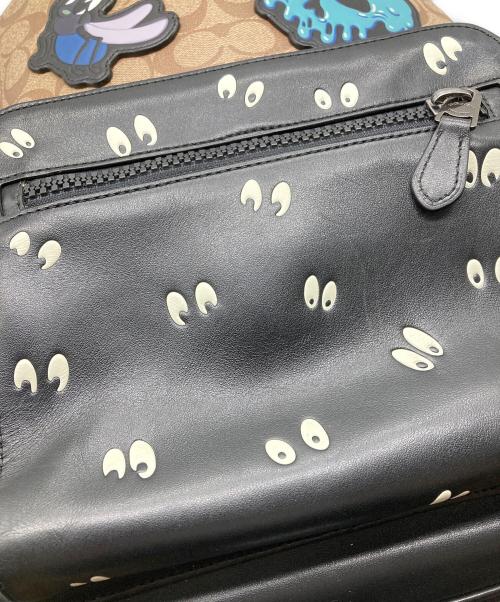 COACH（コーチ）COACH (コーチ) Disney (ディズニー) シグネチャー×レザーコンビリュック ブラック×ベージュの古着・服飾アイテム