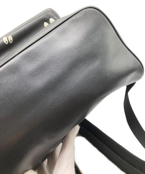 COACH（コーチ）COACH (コーチ) Disney (ディズニー) シグネチャー×レザーコンビリュック ブラック×ベージュの古着・服飾アイテム