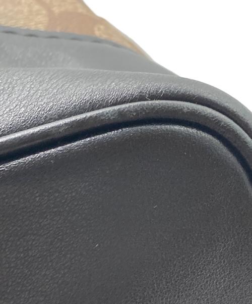 COACH（コーチ）COACH (コーチ) Disney (ディズニー) シグネチャー×レザーコンビリュック ブラック×ベージュの古着・服飾アイテム