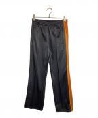 Needles×UNIONニードルズ×ユニオン）の古着「別注トラックパンツ」｜オレンジ×ブラック
