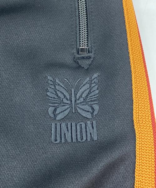 Needles（ニードルズ）Needles (ニードルズ) UNION (ユニオン) 別注トラックパンツ オレンジ×ブラック サイズ:Sの古着・服飾アイテム