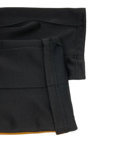 Needles（ニードルズ）Needles (ニードルズ) UNION (ユニオン) 別注トラックパンツ オレンジ×ブラック サイズ:Sの古着・服飾アイテム