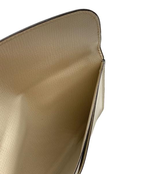 Valextra（ヴァレクストラ）Valextra (ヴァレクストラ) レザーフラップカードケース アイボリーの古着・服飾アイテム