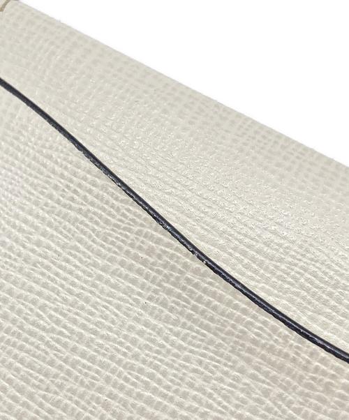 Valextra（ヴァレクストラ）Valextra (ヴァレクストラ) レザーフラップカードケース アイボリーの古着・服飾アイテム