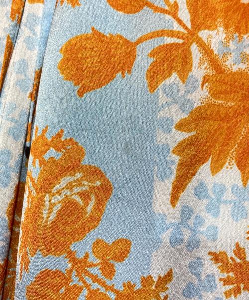 TELMA（テルマ）TELMA (テルマ) フラワープリントパンツ ブルー×オレンジ サイズ:34の古着・服飾アイテム